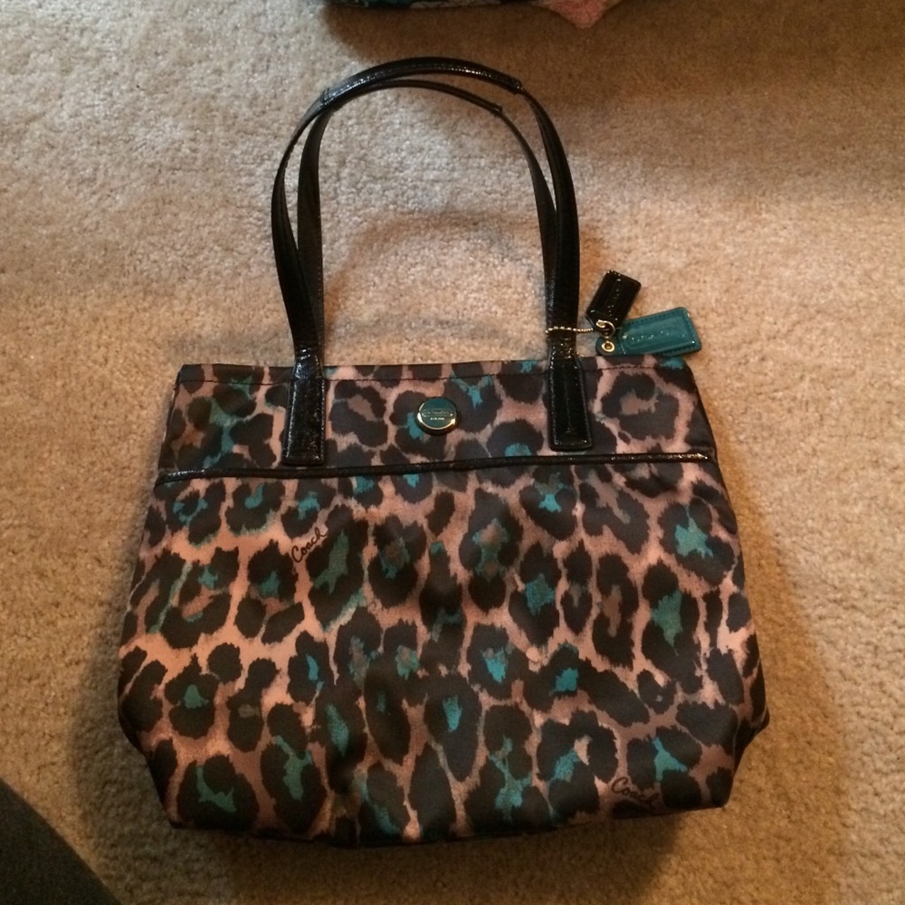 Perfect Ocelot Aqua Coach bag